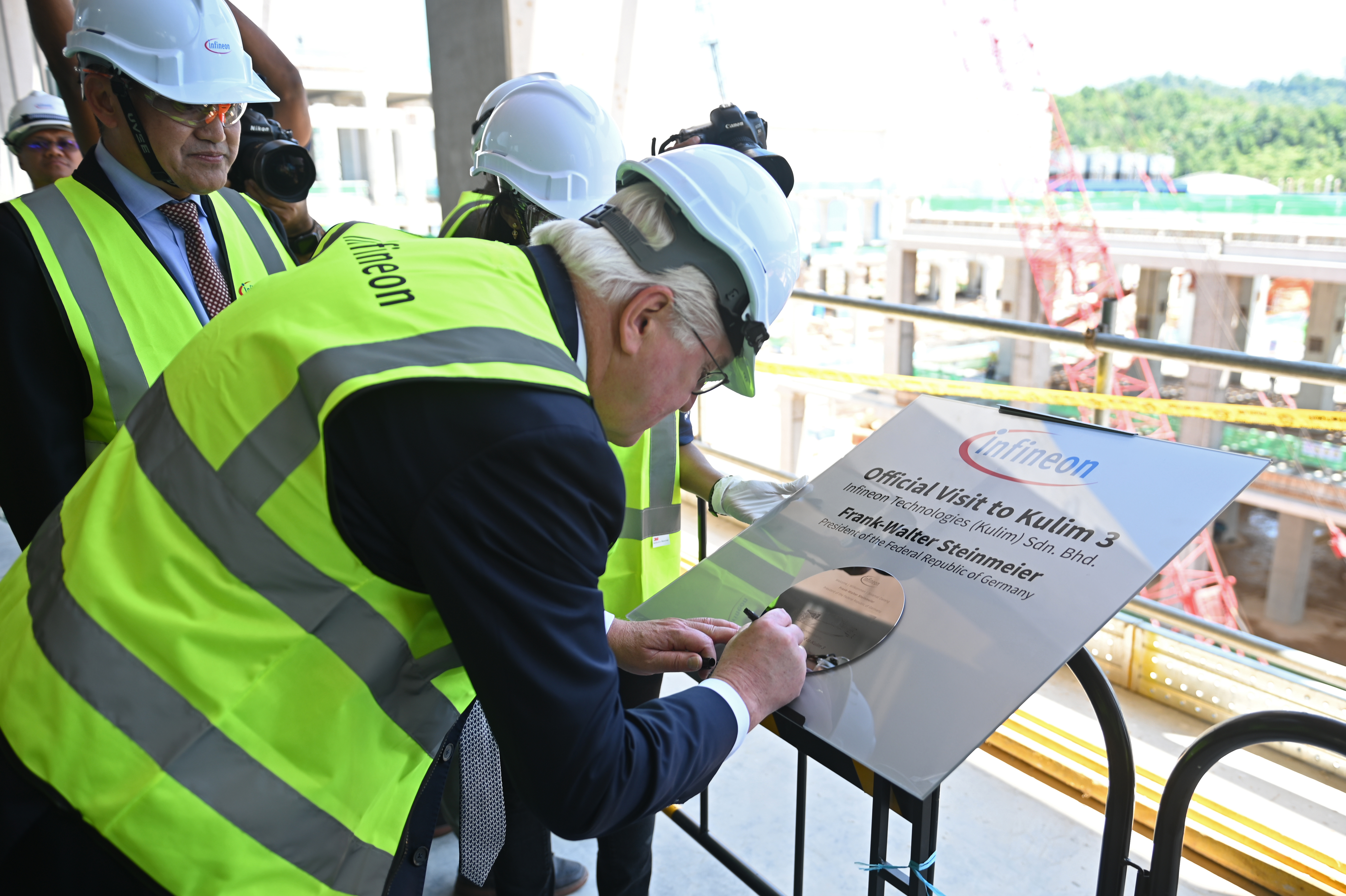 Frank-Walter Steinmeier Federal President of Republic of Germany signs on wafer