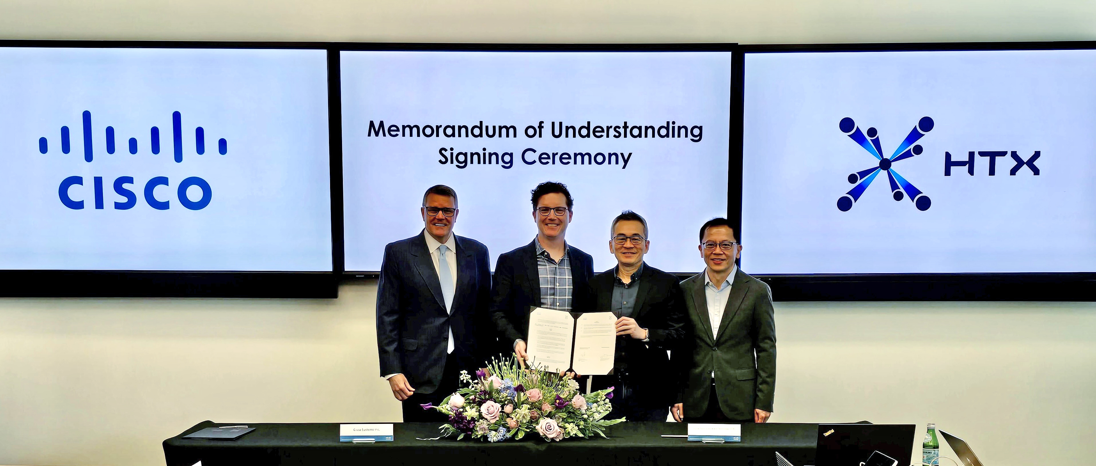 From left to right: Dr. Guy Diedrich, Senior Vice President & Global Innovation Officer, Cisco; Mr. Jonathan Davidson, Executive Vice President and General Manager, Cisco Networking; Mr. Chan Tsan, Chief Executive, HTX; Mr. Aubeck Kam, Chairman, HTX.