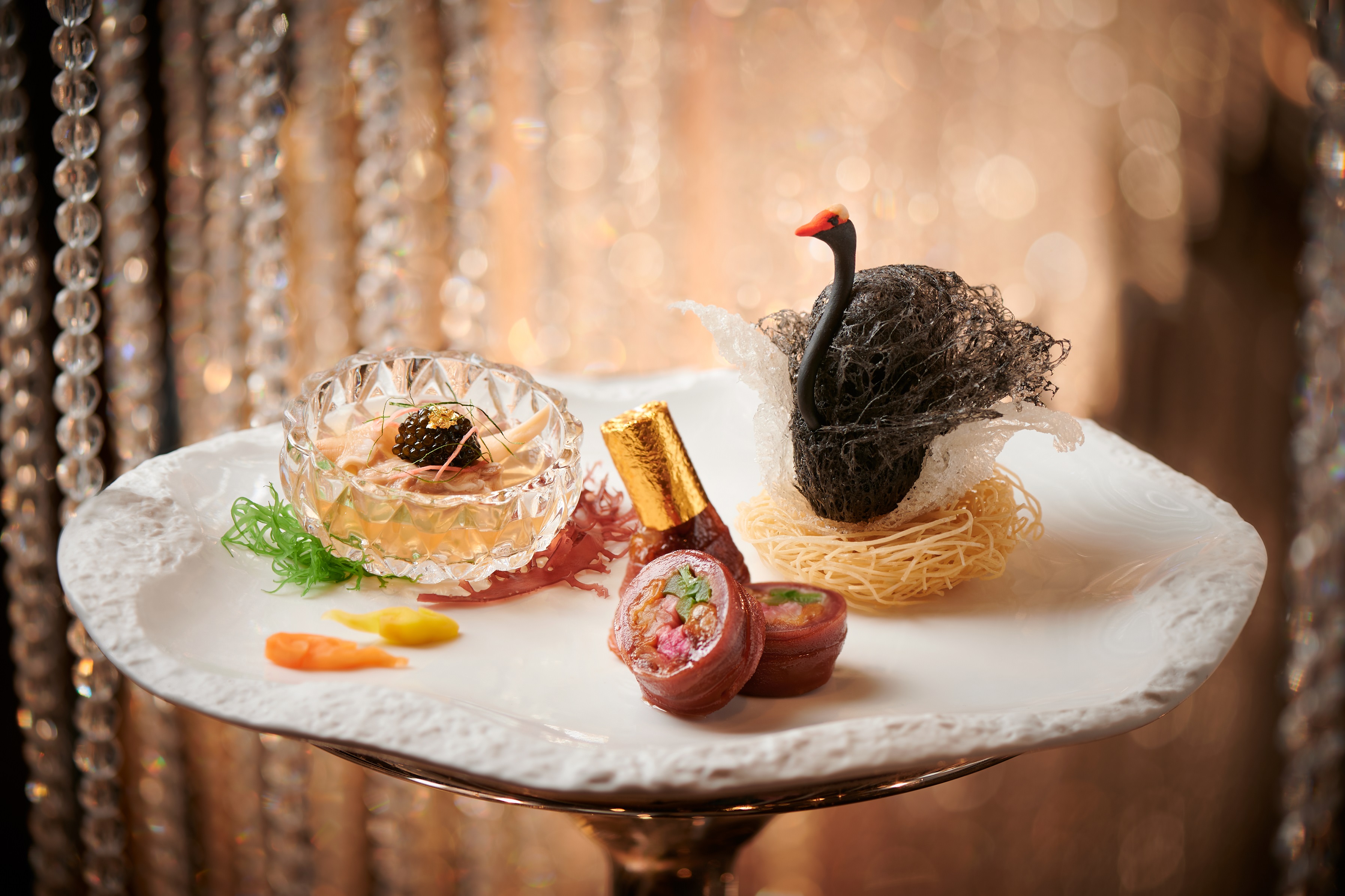 Ying’s appetizer trio of Chilled Fresh Surf Clams with Black Caviar and Clams Soup Jelly, Deep-fried Taro Dumpling Stuffed with Yogurt, and Lychee Wood Roasted Goose Webs Stuffed with Iberico Pork and Foie Gras