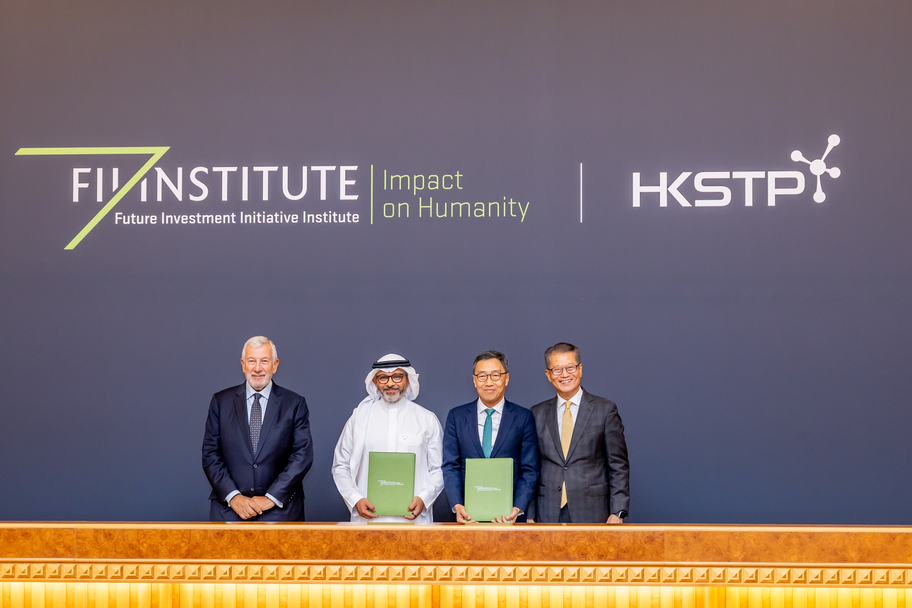 Witnessed by the HKSAR Financial Secretary Paul Chan (first from right) and FII Institute’s CEO Richard Attias (first from left), Albert Wong, CEO of HKSTP (second from right) and Rakan Tarabzoni, COO of FII Institute (second from left) signed a strategic partnership.