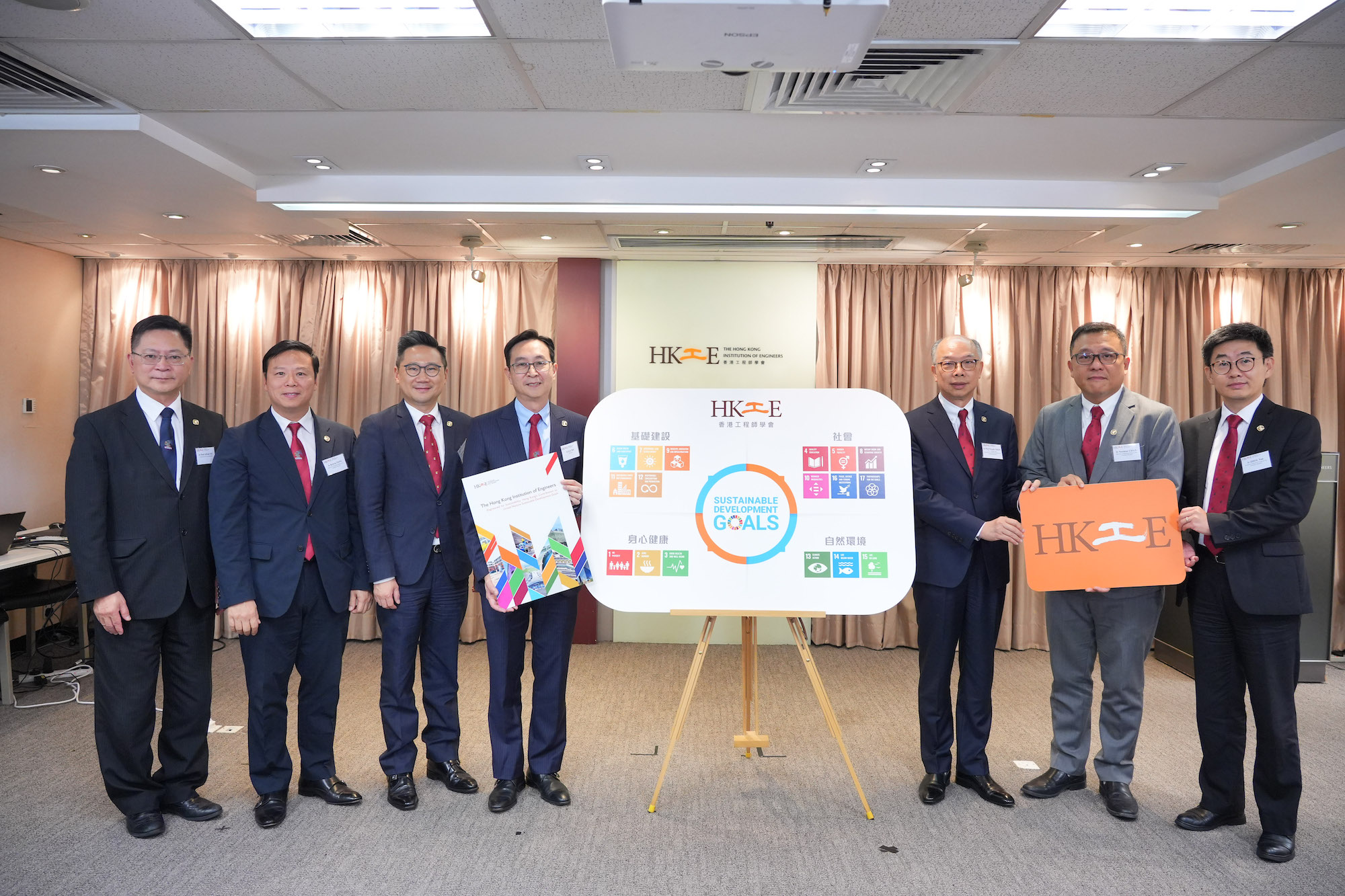 Ir Eric MA, President (4th left), Ir Prof Frank CHAN, Vice President cum Advisor of the Working Group (3rd right), Ir Wilson KWOK, Chairman of the Working Group (3rd left), Ir Norman CHAN, Member of Working Group (2nd right), Ir Kelvin TANG, Member of Working Group (2nd left), Ir ZHOU Yan, Member of Working Group (1st right), and Ir Prof Alfred SIT, Chief Executive and Secretary (1st left) attended the launch of HKIE’s UNSDGs eBook Engineered for Sustainability: Hong Kong’s Contribution to United Nations Sustainable Development Goals.