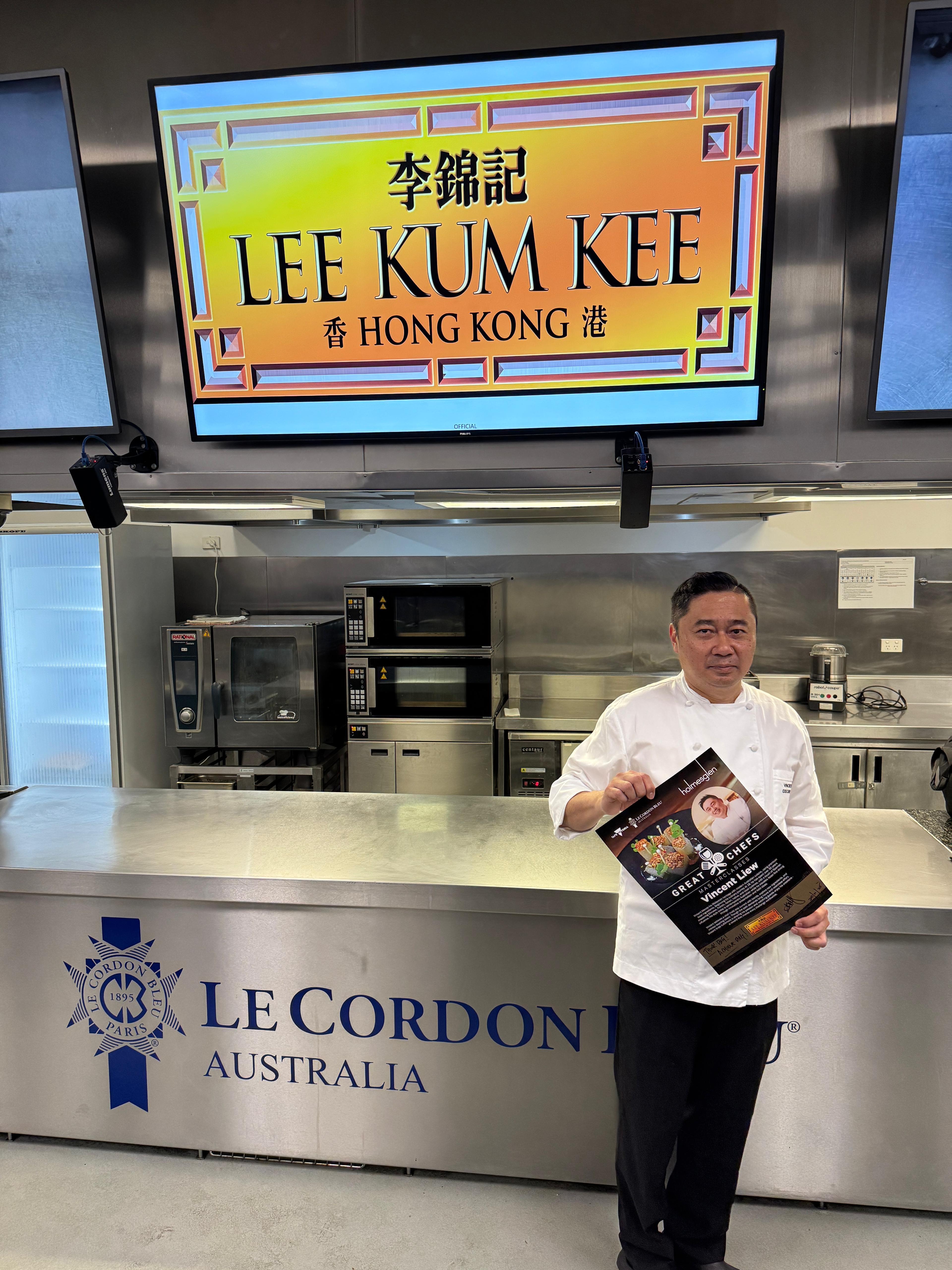 Chef Vincent receives a certificate from Le Cordon Bleu as a token of appreciation